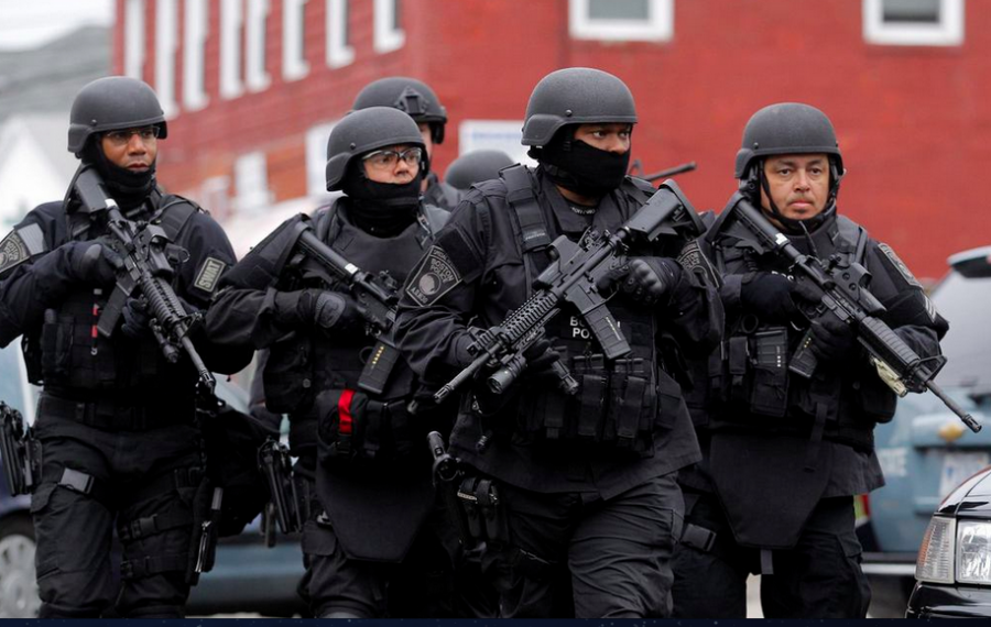 Boston cops hunt bomber (courtesy Reuters)