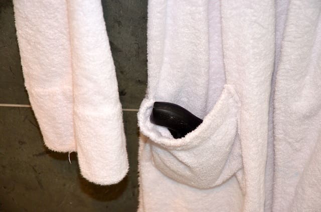 Gemini Customs Smith & Wesson 642 in the pocket of a bathrobes.com bathrobe (courtesy The Truth About Guns)