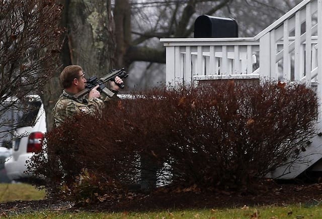 Connecticut SWAT team member with his future personal AR-15