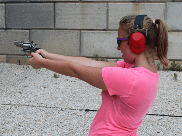 woman shooting a snub nose .357 Magnum