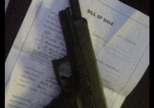 "Jill Schaller took a picture of the Glock pistol and bill of sale before returning it to the seller." (Caption courtesy USA Today. Photo- Reno Gazette-Journal)