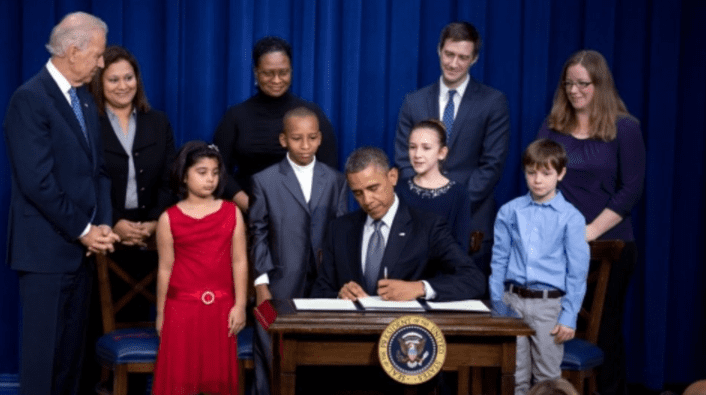 President Obama signs Executive Orders funding anti-gun research (courtesy polygon.com)
