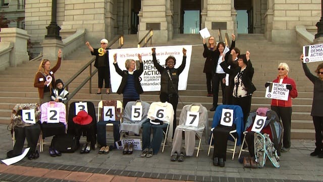 Moms demanding action outnumber empty chairs---by one (courtesy cbsdenver.com)
