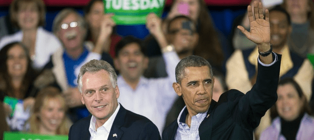 President Barack Obama appears at a campaign rally with supporters for Virginia Democratic gubernatorial candidate Terry McAuliffe, left, at Washington Lee High School in Arlington, Va., Sunday, Nov. 3, 2013. (courtesy AP)