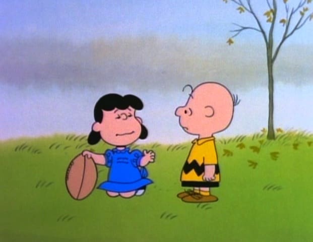 Charlie Brown and Lucy negotiating (courtesy holidayfilmreviews.blogspot.com)
