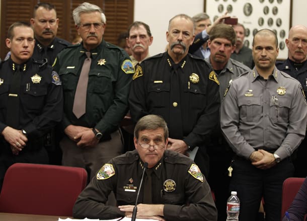 Weld County Sheriff John Cooke (center) (courtesy denverpost.com)