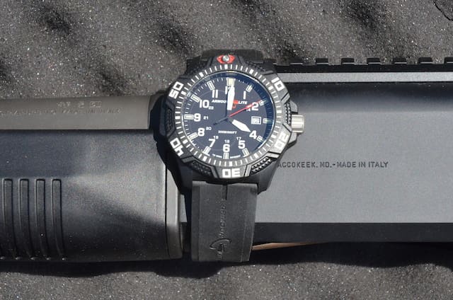 Armorlite Isobrite 100 Series watch strapped to a Benelli M4 (courtesy The Truth About Guns)