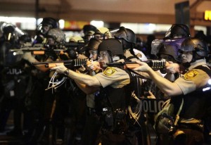 Ferguson cops (courtesy bostonglobe.com)