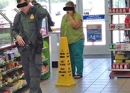 U.S. Border Patrol Agent open carrying a rifle in a convenience store (courtesy valleycentral.com)