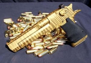 Gold gun (courtesy thedailysheeple.com)