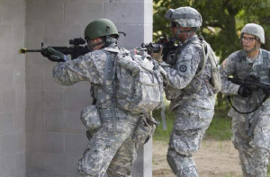 "City Wars: U.S. soldiers conduct urban training at Camp Blanding, Florida. Army planners believe future battles will be fought in 'megacities' of 20 million or more people." (Caption courtesy armytimes.com, photo courtesy Sgt. 1st Class Mark Bell/ / Army)