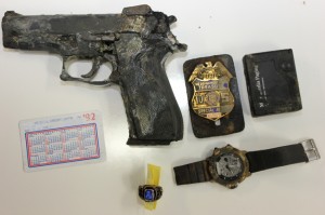 ATF agent's gun, badge (courtesy cbsla.com)