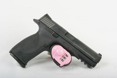 Smith & Wesson M&P with pink combination trigger lock (coutesy tactical gear.com)