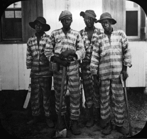 Convicts leased to harvest timber in Florida, 1915 (courtesy wikipedia.org)