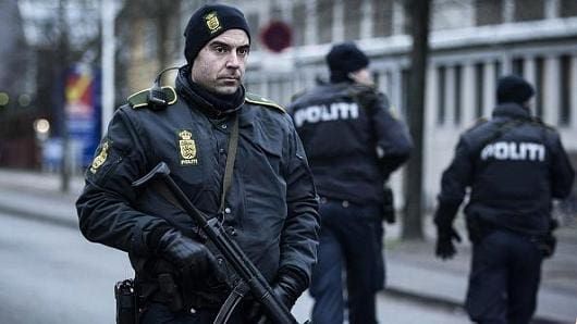 Danish policeman 1000-yard stare (courtesy cnbc.com)