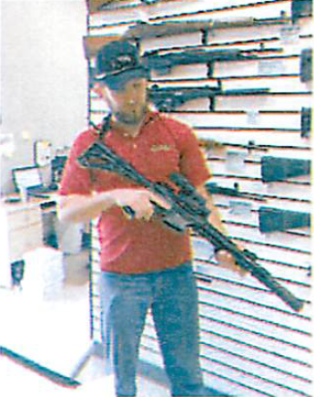 clerk-with-rifle