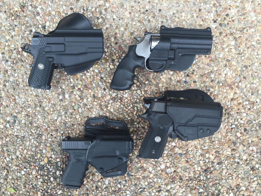 Wilson Combat X-TAC Commander 1911, Smith & Wesson 686, GLCOK 19 and SIG SAUER P229 Legion Series (courtesy The Truth About Guns)