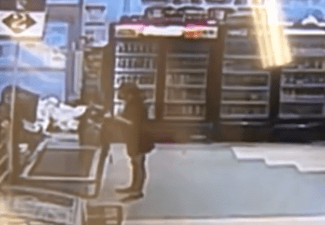 Security footage of eight-year-old boy robbing a Florida convenience store (courtesy wral.com)