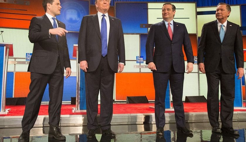 US Republican Presidential candidates (L-R) Marco Rubio, Donald Trump, Ted Cruz and John Kasich pose for a photo at start of the Republican Presidential Debate in Detroit on March 3, 2016. / AFP / Geoff Robins (Photo credit should read GEOFF ROBINS/AFP/Getty Images)