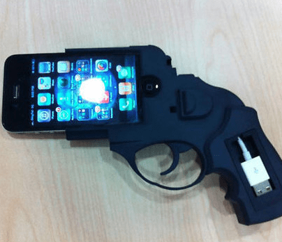 Gun-shaped cell phone case (courtesy newswire.net)