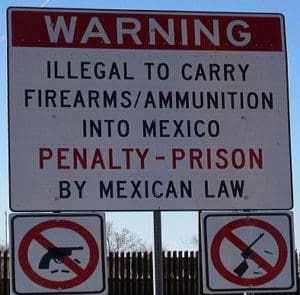 mexico-gun-sign-at-border