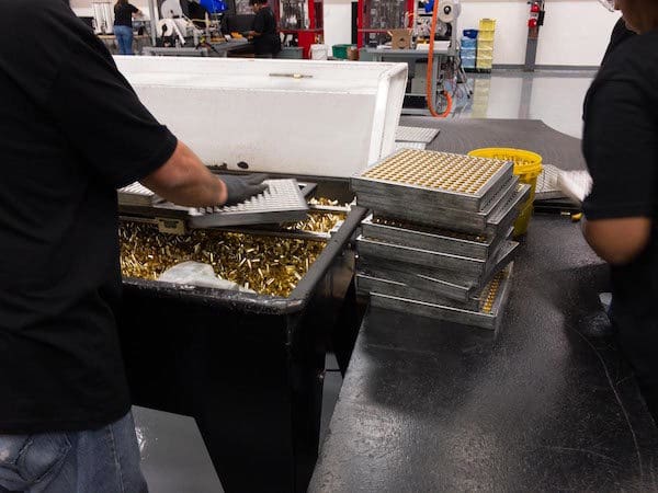 SIG SAUER's brass case loading system in action (courtesy ammoland.com)