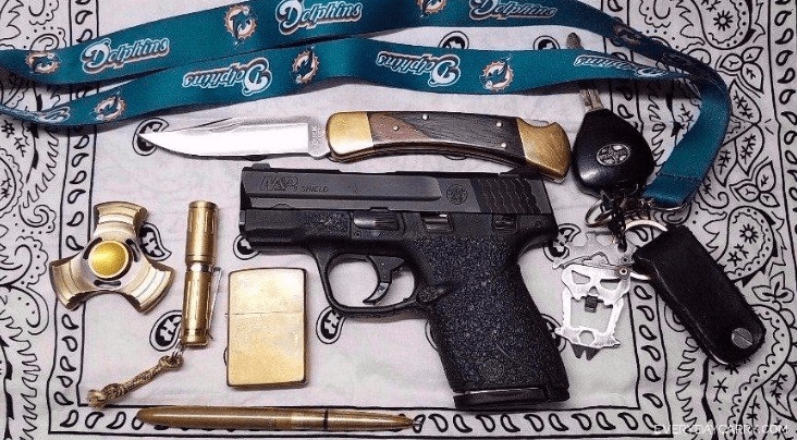 Dee's EDC gear featuring the Smith & Wesson M&P9 Shield