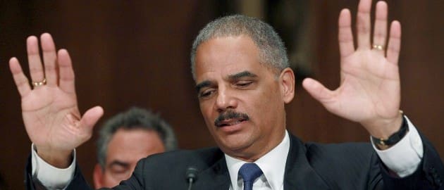 Eric Holder wasn't interested in prosecuting prohibited persons who tried to buy guns. (courtesy Daily Caller and Getty)