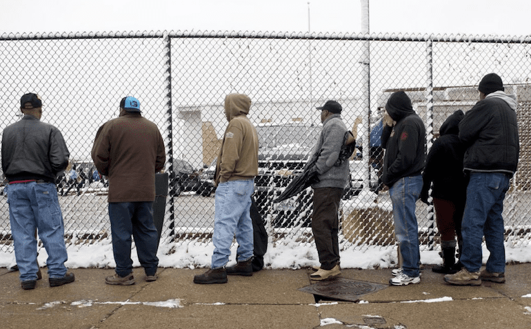 Customers for St. Louis gun buyback standing in the cold (courtesy stltoday.com)
