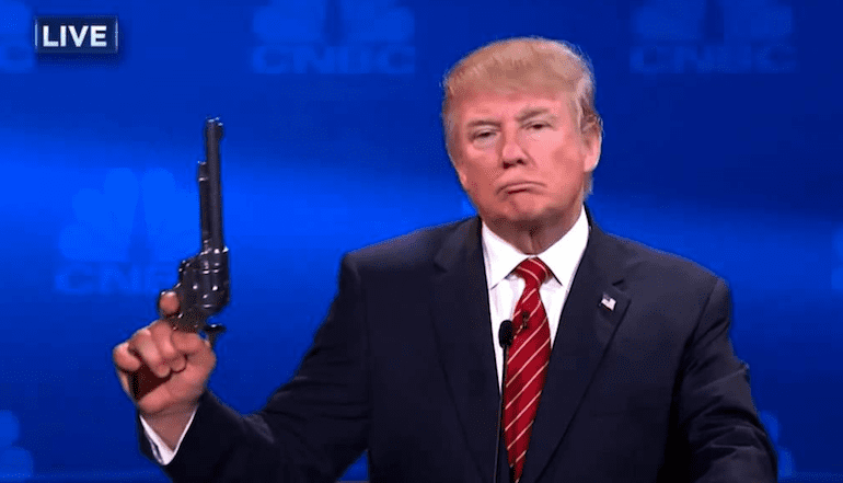 Donald Trump and revolver (courtesy patdollard.com)