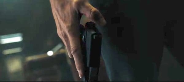 Liam Neeson with gun in Commuter (courtesy youtube.com)