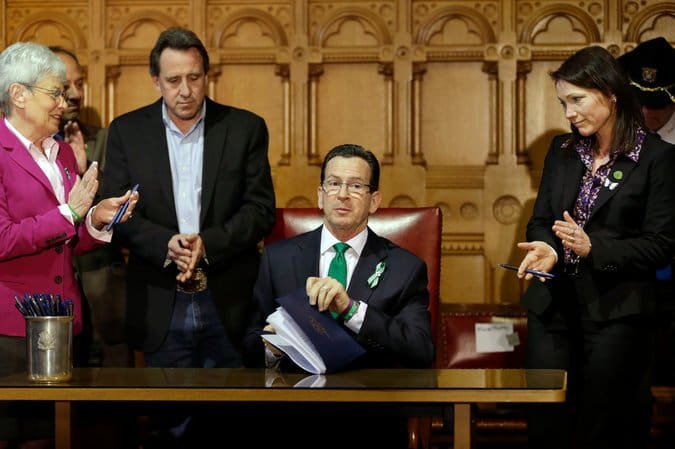 Governor Malloy moments after degrading Constitution State residents' natural, civil and Constitutionally protected right to keep and bear arms (courtesy nytimes.com)