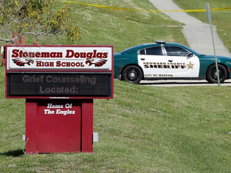 Grief counseling at Marjory Stoneman Douglas High School (courtesy abcnews.go.com)