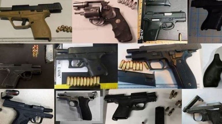 TSA confiscated firearms (courtesy latimes.com)