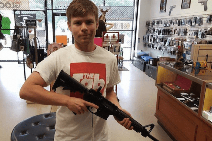 Young man with an AR-15 (courtesy thetab.com)