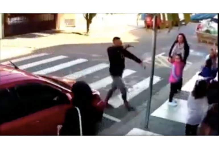 woman shoots armed man in brazil video