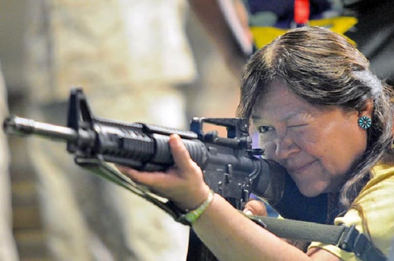 Navajo Woman Learns to Shoot M16A4 (image from http://www.navajotimes.com/entertainment/people/2011/0511/051211marines.php)