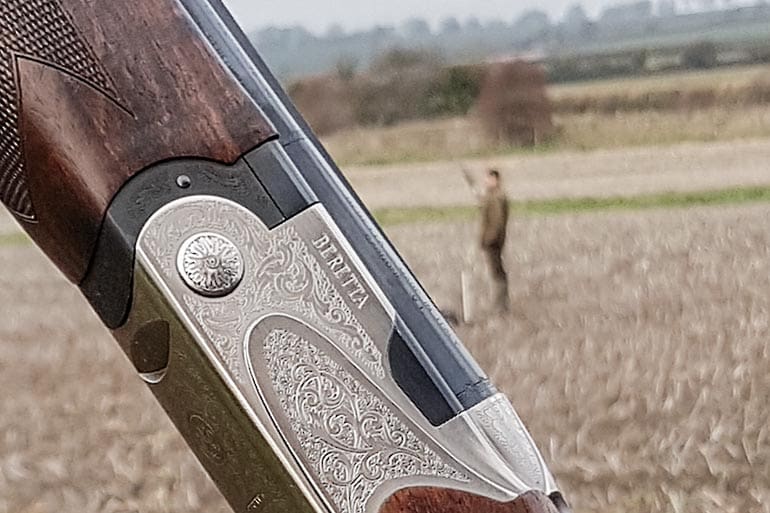 Bisley Shooting Tie Featuring Standing Pheasants On A Green Background 