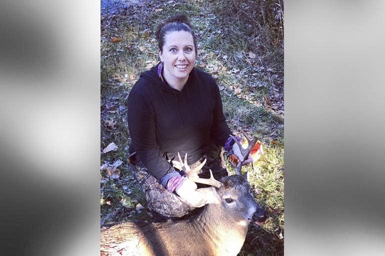 Tinder bans woman hunter for deer trophy photo