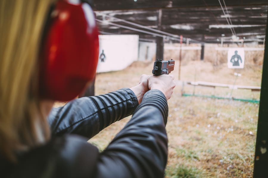 woman gun shoot range practice