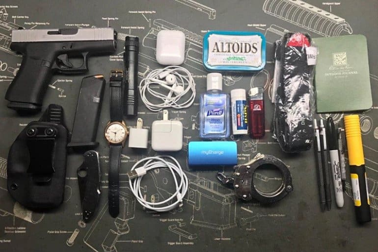 Zookeeper with Handcuffs: Everyday Carry Pocket Dump of the Day