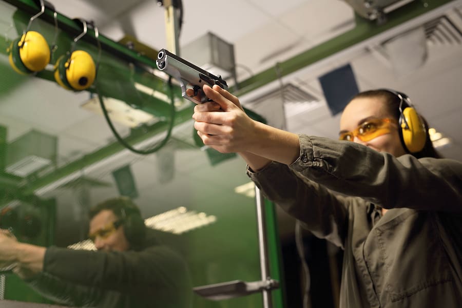 woman gun range training lesson