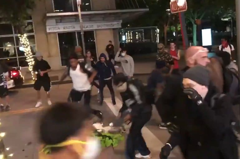 Dallas store owner beaten riot