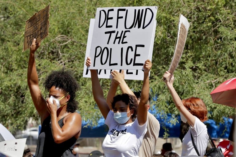 Defund the police ap photo