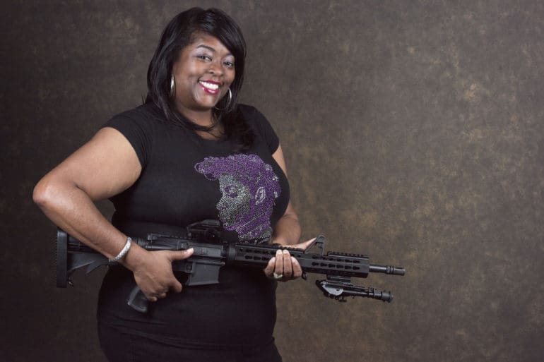 black women woman gun owner