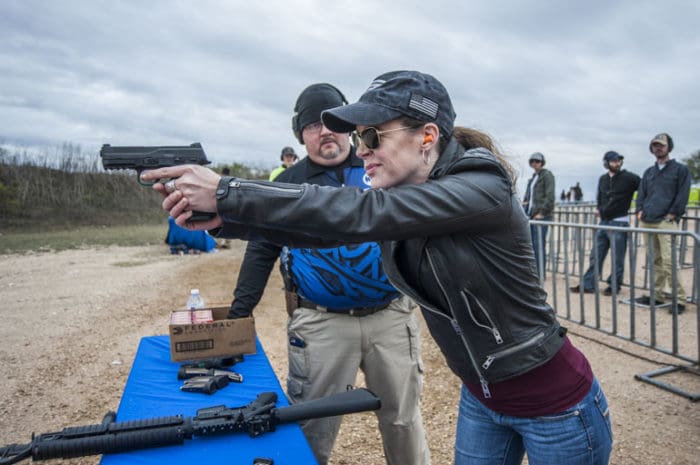 woman shooting range pistol gun training