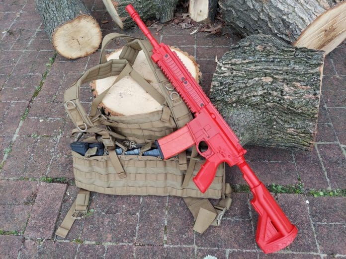 red gun rifle dummy guns from ASP and a Blackhawk chest rig.