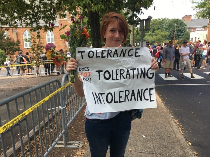 tolerance intolerance protest sign