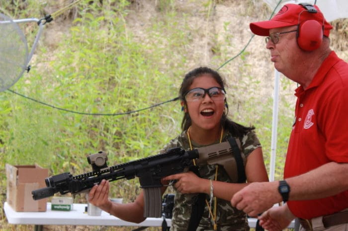 Guns save life girl ar-15 rifle camp
