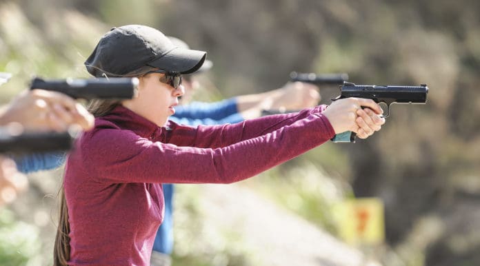 gun range train shoot pistol woman